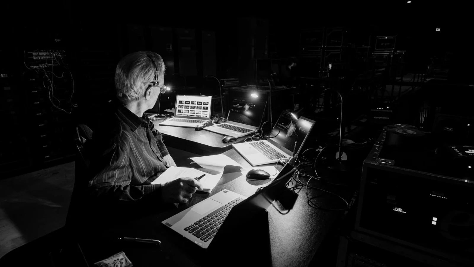 AV production partner coordinating event show control and technical planning in backstage production environment