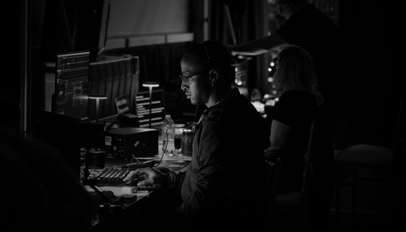 innovent technologies live event control room production team.png Innovent Technologies production team member operating event control systems and show graphics during a live conference