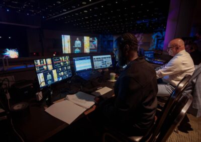 AV technician managing live event production behind the scenes at Atlanta Regional Commission State of the Region