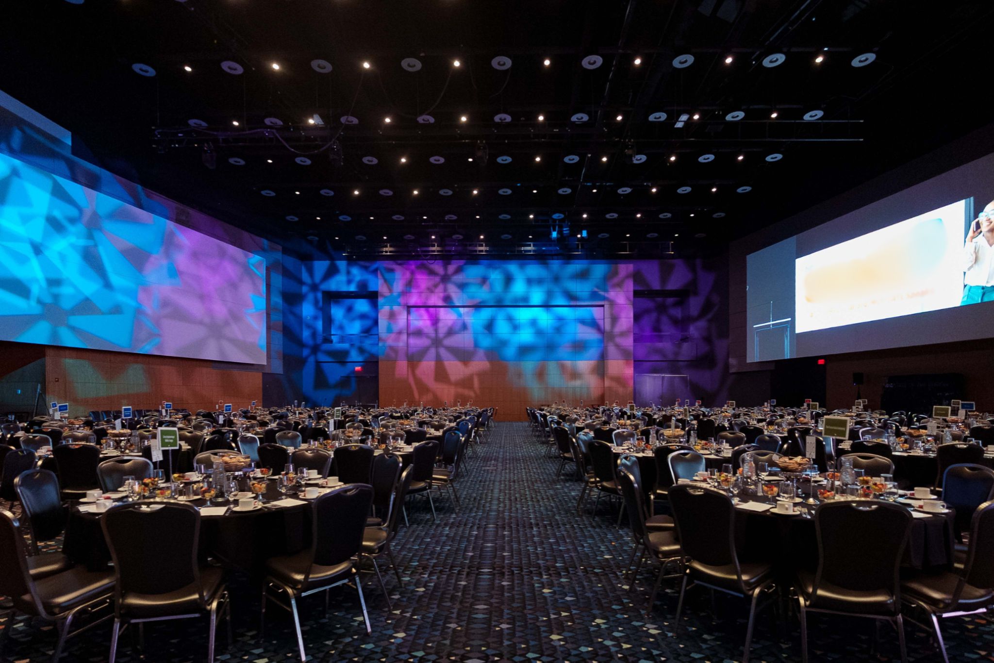 atlanta corporate gala event production ballroom lighting.jpg Large corporate gala ballroom setup with custom lighting design and projection mapping for event production in Atlanta