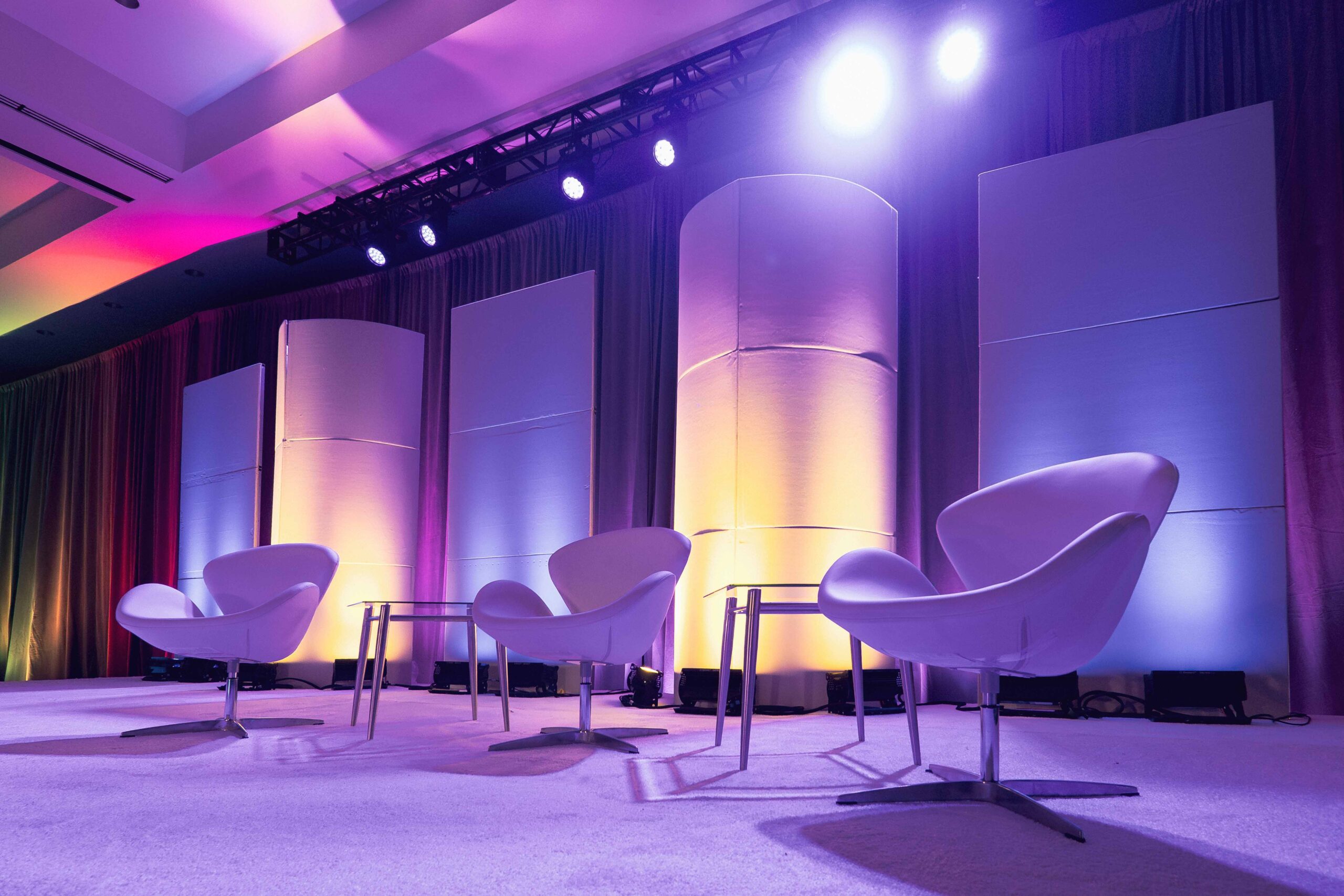 atlanta corporate stage design av production innovent technologies.jpg Modern corporate stage design with custom scenic panels, lighting wash, and lounge seating produced by Innovent Technologies in Atlanta