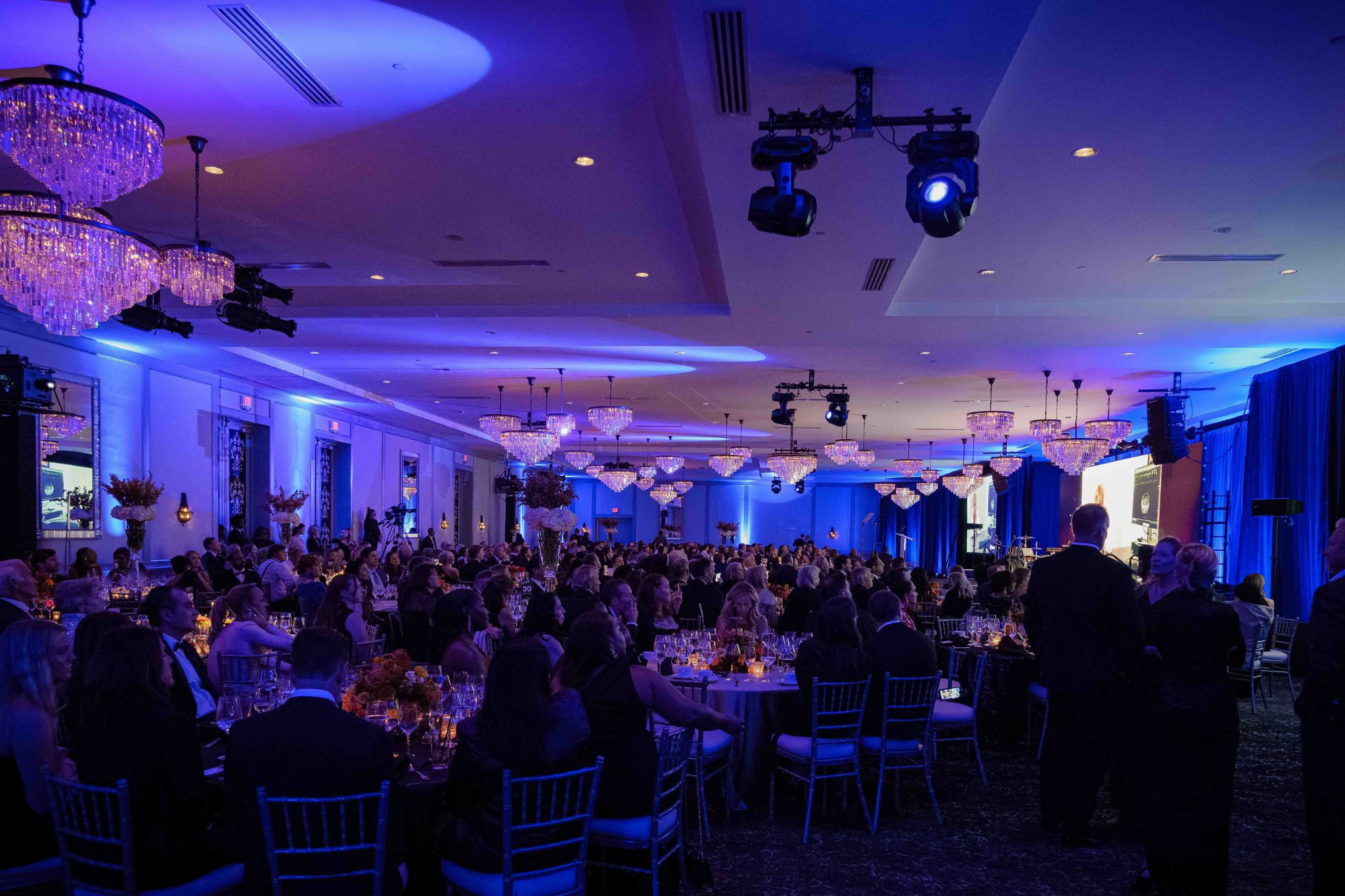 atlanta gala event lighting av production innovent technologies.jpg Formal gala event in Atlanta with stage lighting, LED screens, chandeliers, and full banquet seating produced by Innovent Technologies