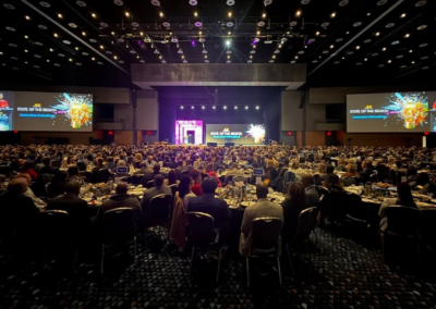 Atlanta Regional Commission State of the Region general session with large-scale LED video walls, keynote stage, and full ballroom audience produced by Innovent Technologies