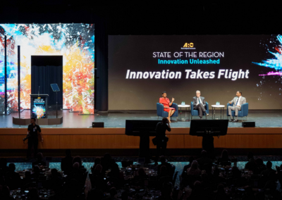 Atlanta Regional Commission State of the Region keynote panel with large-format LED video wall and custom LED arch structures produced by Innovent Technologies