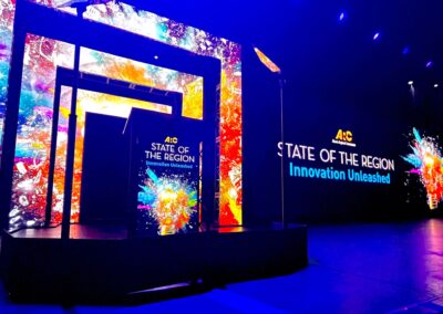 Atlanta Regional Commission State of the Region stage with custom LED arch structures, branded LED video wall, and keynote podium produced by Innovent Technologies