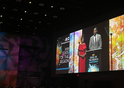 Large-format LED video wall displaying live keynote presentation at the Atlanta Regional Commission State of the Region produced by Innovent Technologies