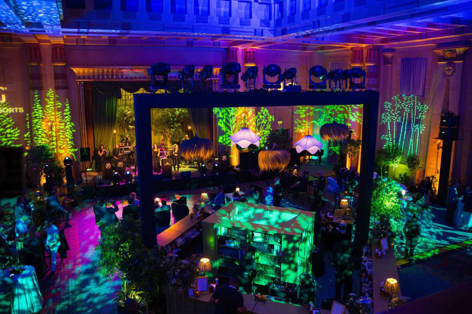 IHG Hotels & Resorts post-conference celebration at The Fox Theatre featuring live band, custom lighting design, scenic greenery, and full event production by Innovent Technologies