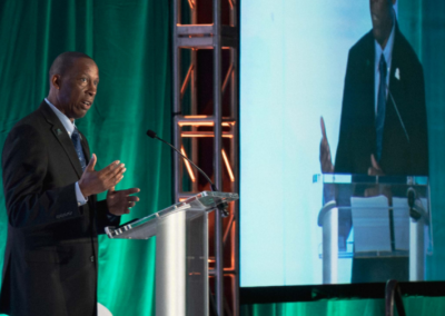 Keynote speaker on stage with live IMAG screen at NCSEA Leadership Symposium