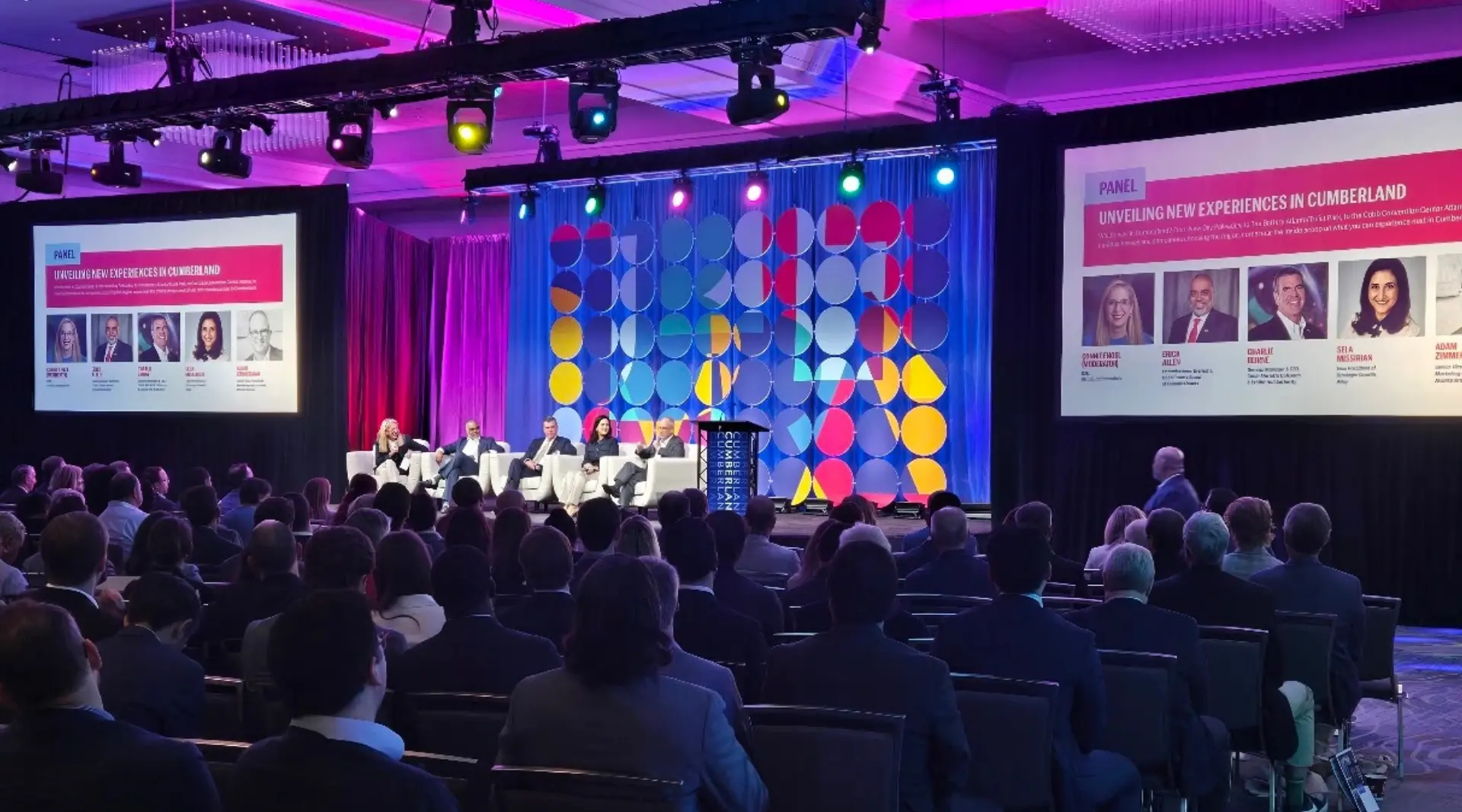 Corporate panel event with LED stage design, projection screens, and lighting production in Atlanta by Innovent Technologies
