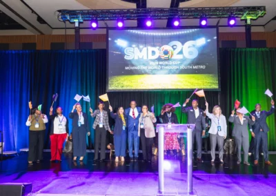 Group presentation on stage with LED screen, lighting design, and corporate event production by Innovent Technologies