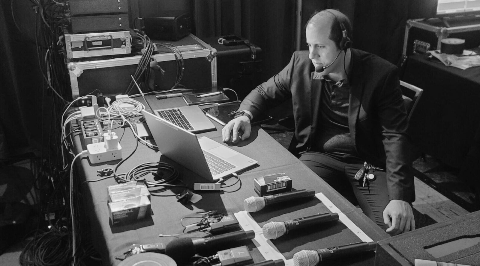 Conference Audio Setup and Show Control Atlanta Microphone and audio setup for corporate conference with AV technician managing show control in Atlanta