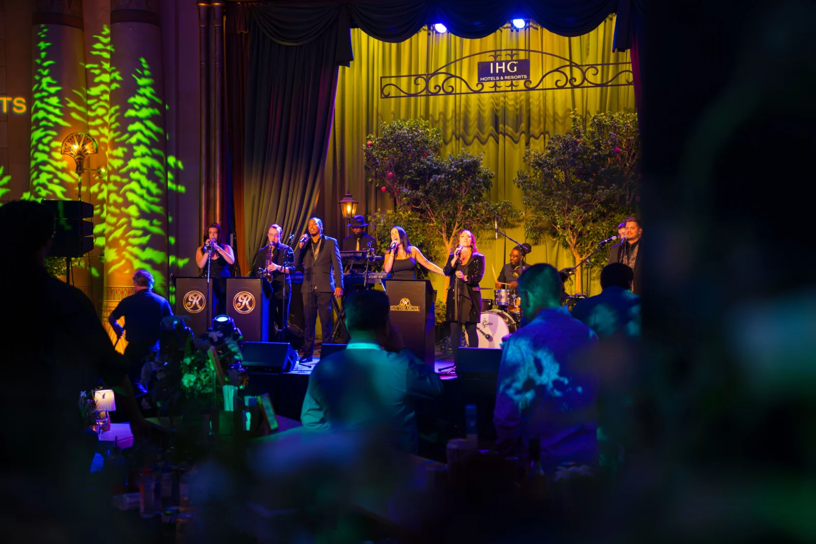 Live Band Stage Production – Fox Theatre Atlanta Event Live band performing at Fox Theatre Atlanta during IHG corporate event with stage lighting and audience engagement