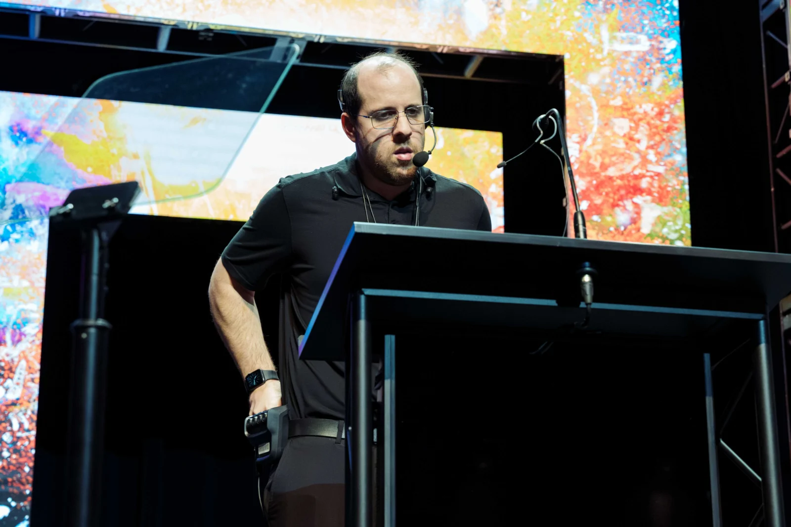 Technical director managing live conference AV production during rehearsal at the Georgia World Congress Center
