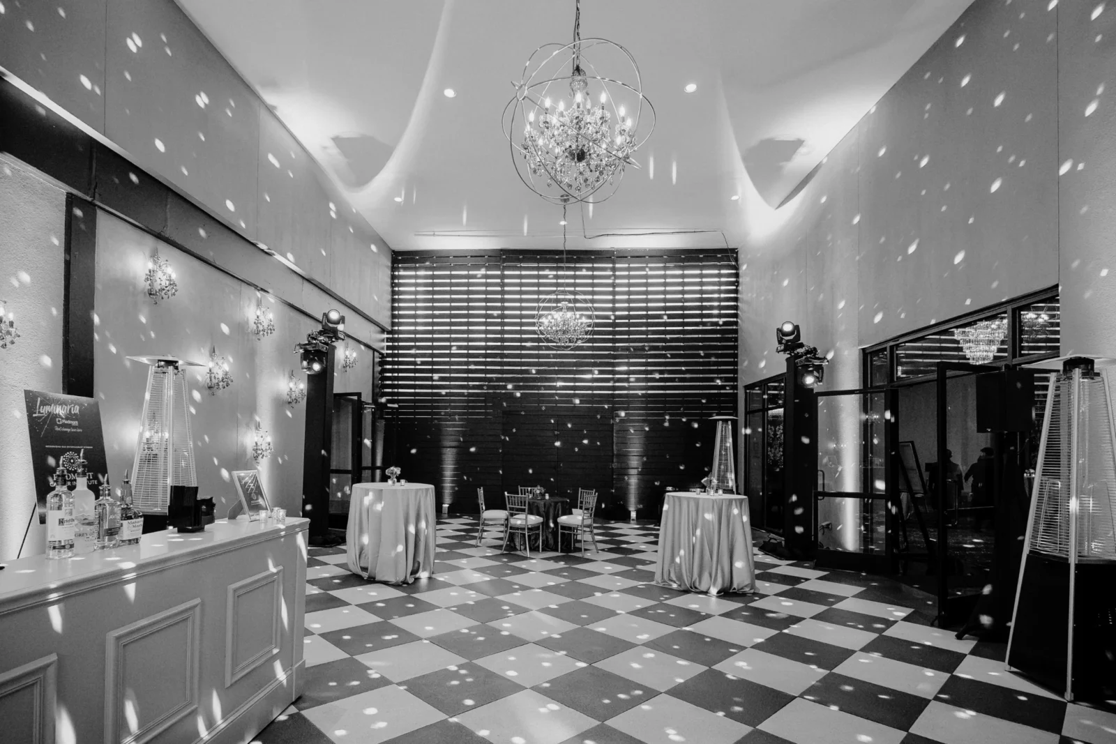 Elegant conference event space with lighting, AV equipment, and room setup for multi-track breakout planning